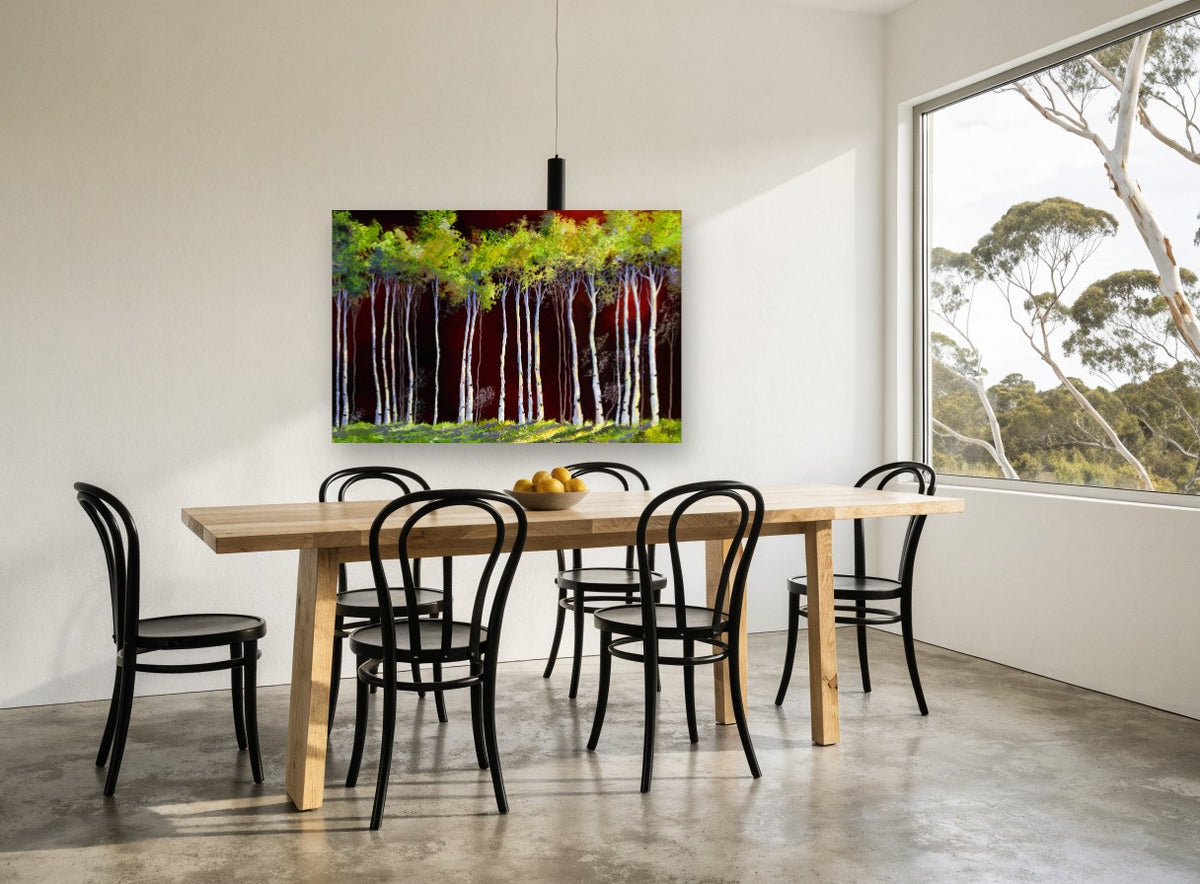 Birches Against Crimson landscape canvas print on the wall of a dining room