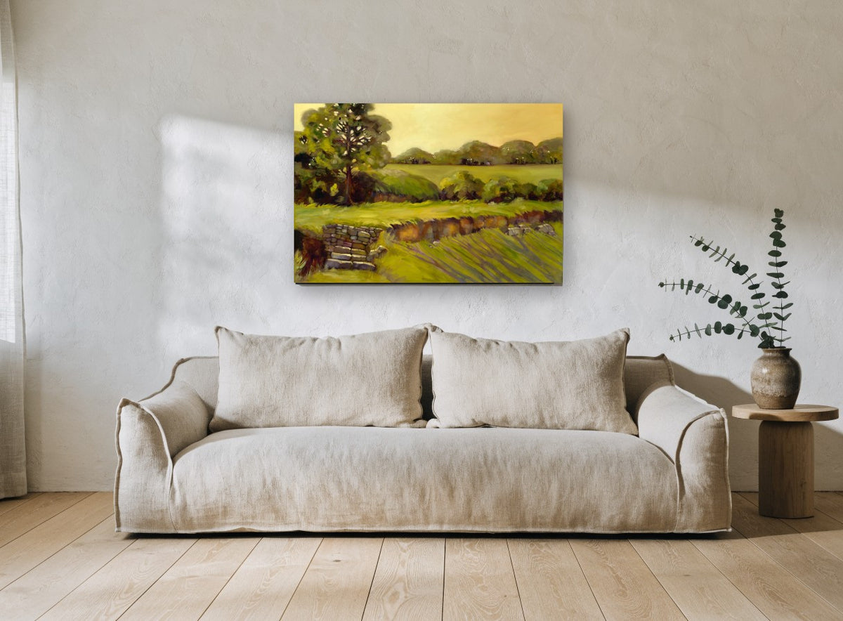 Golden Stone Wall Pasture landscape canvas print on the wall of a living room