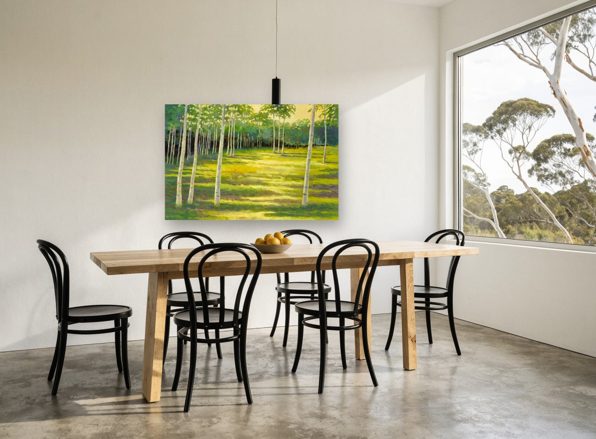 Birch Glade Light landscape canvas print on the wall of a dining room