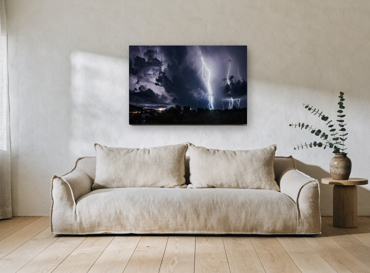 Storm Over Treeline landscape canvas print on the wall of a living room
