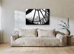 Through the Clock Face city canvas print on the wall of a living room
