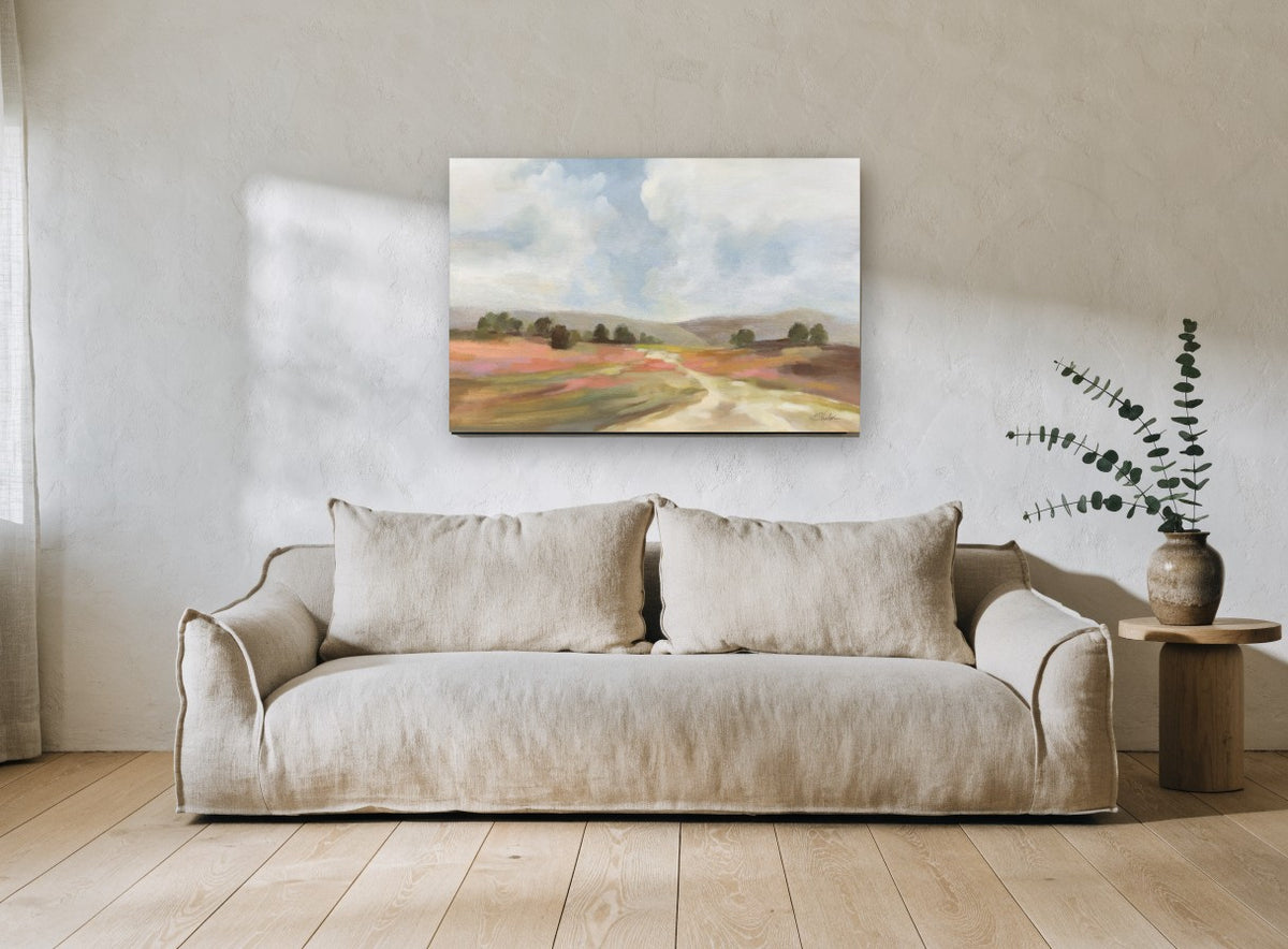 Blush Meadow Track landscape canvas print on the wall of a living room