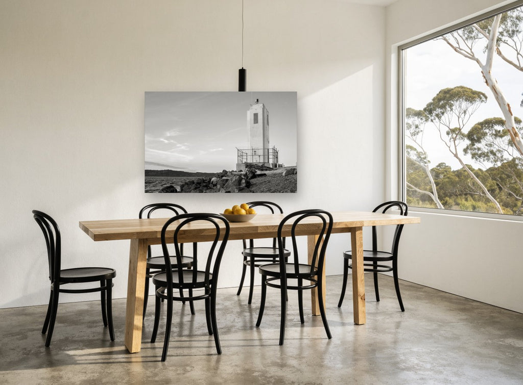 Concrete Beacon Shore coastal canvas print on the wall of a dining room