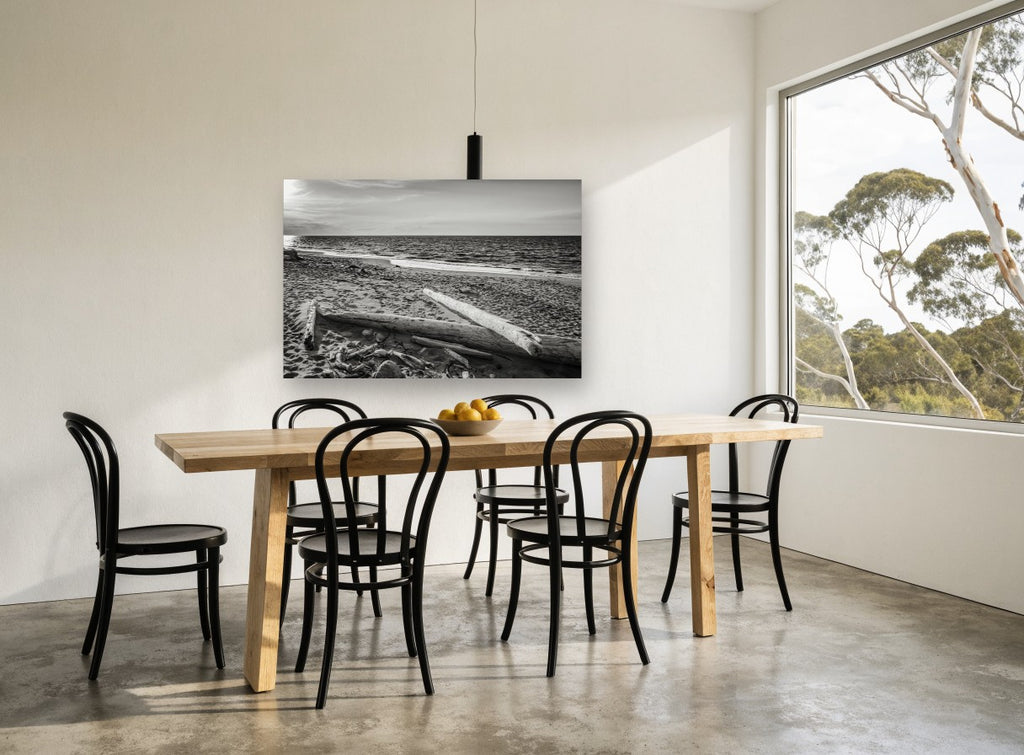 Driftwood Shore Light coastal canvas print on the wall of a dining room