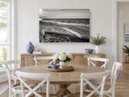 Driftwood Shore Light coastal canvas print on the wall of a Hamptons dining room