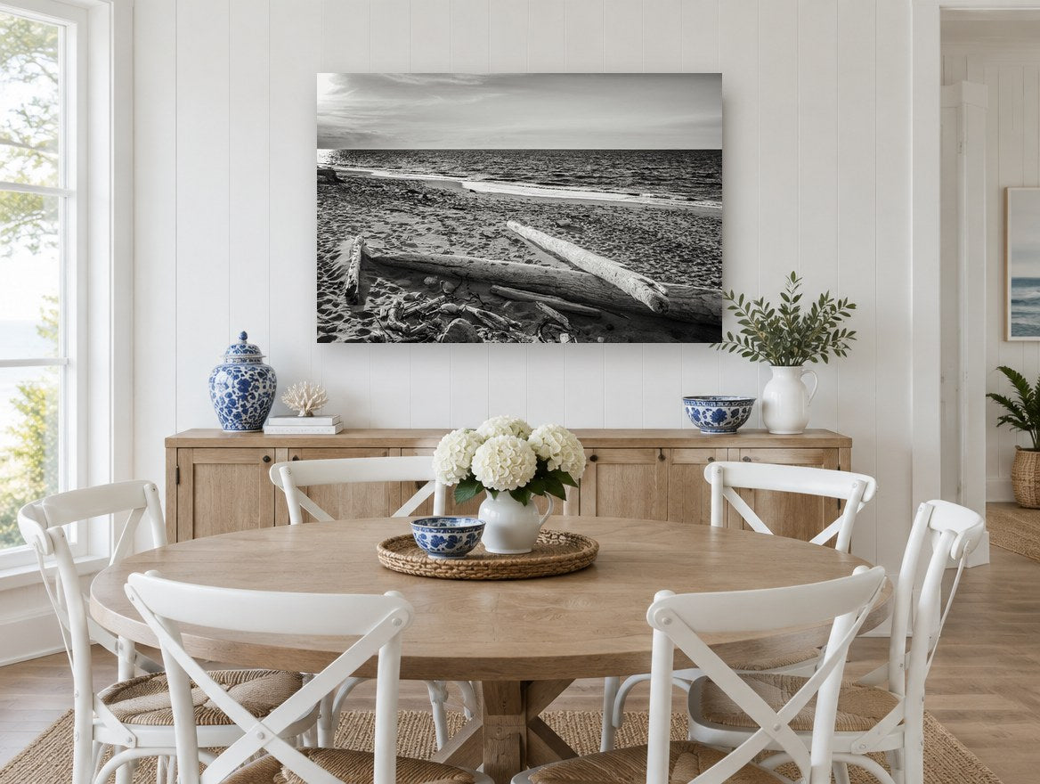Driftwood Shore Light coastal canvas print on the wall of a Hamptons dining room