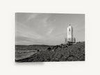 Lonely Shore Beacon, lighthouse on pebble shore black and white, coastal canvas wall art print ready to hang
