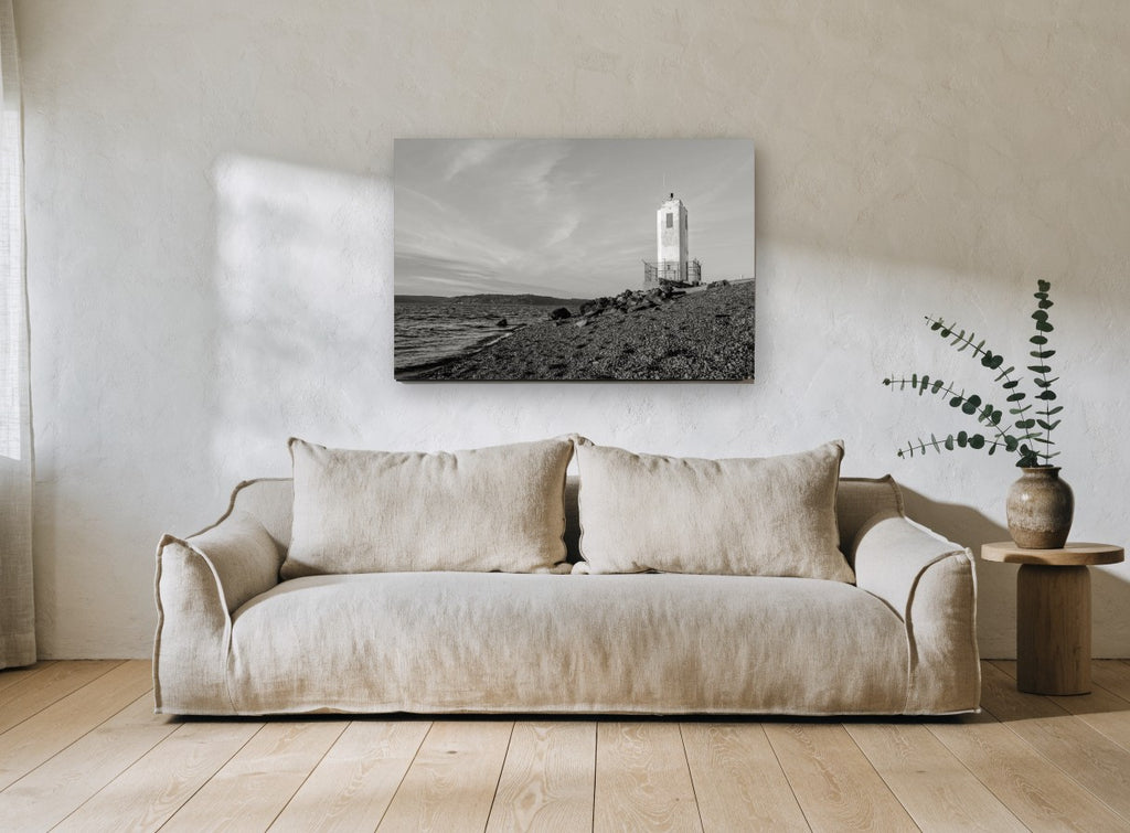 Lonely Shore Beacon coastal canvas print on the wall of a living room