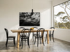 Driftwood and Still Water landscape canvas print on the wall of a dining room