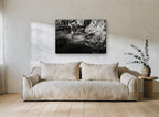 Driftwood and Still Water landscape canvas print on the wall of a living room