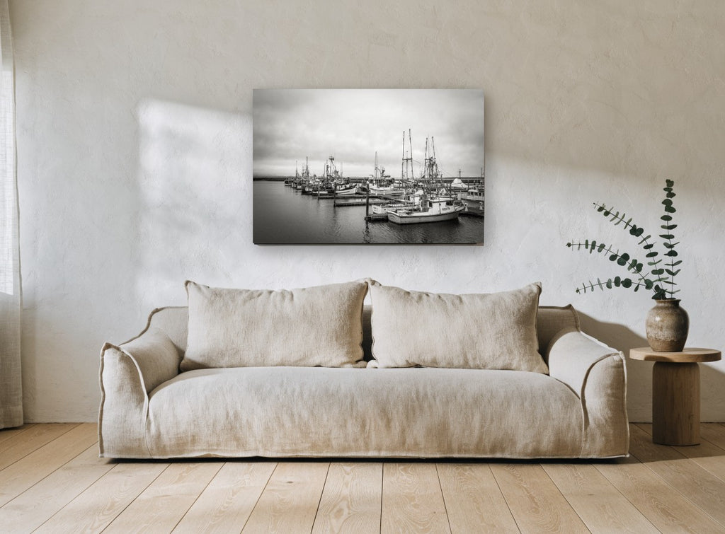 Grey Day Fishing Moorings coastal canvas print on the wall of a living room