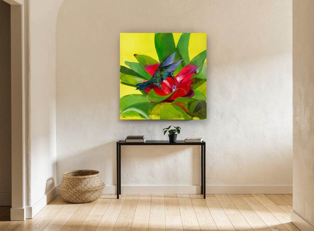Hummingbird at Red Bromeliad floral canvas print on the wall of a hallway
