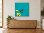Hummingbird on Teal floral canvas print on the wall of a living room above a sideboard
