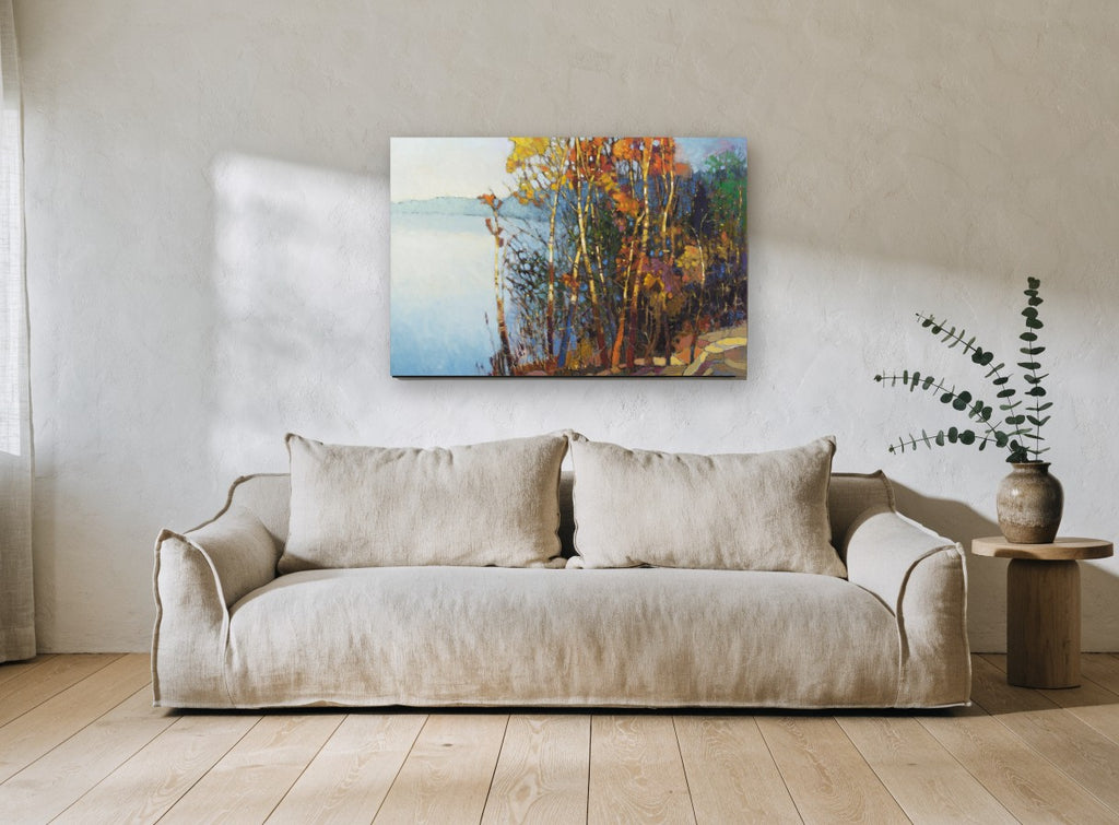 Autumn Birches by the Lake landscape canvas print on the wall of a living room