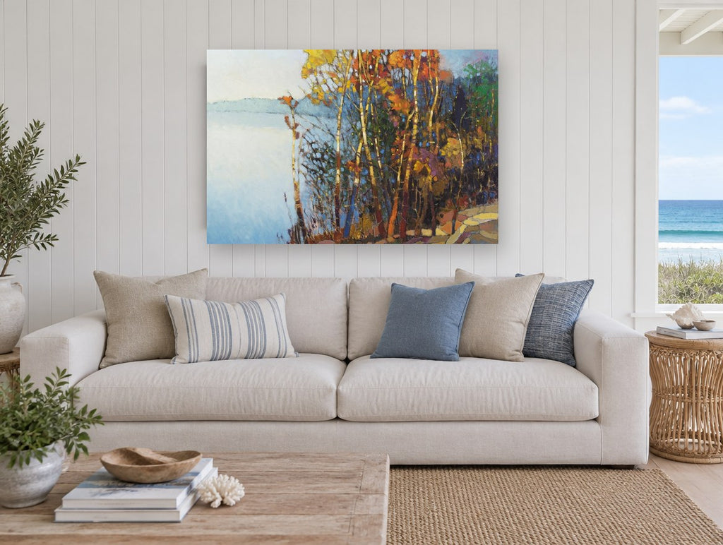 Autumn Birches by the Lake landscape canvas print on the wall of a beach house living room