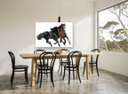 Two Horses Galloping animal canvas print on the wall of a dining room