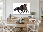 Two Horses Galloping animal canvas print on the wall of a Hamptons dining room