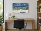 Grey Stones Storm Shore coastal canvas print on the wall of a study