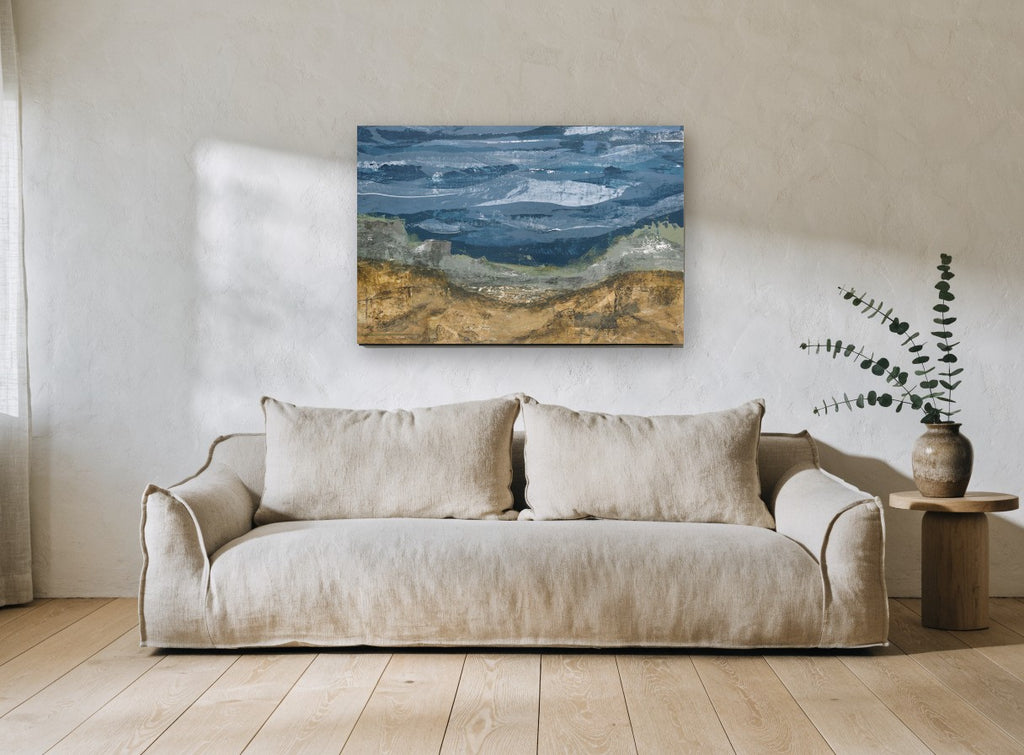 Ochre Hills Over Slate Sea coastal canvas print on the wall of a living room