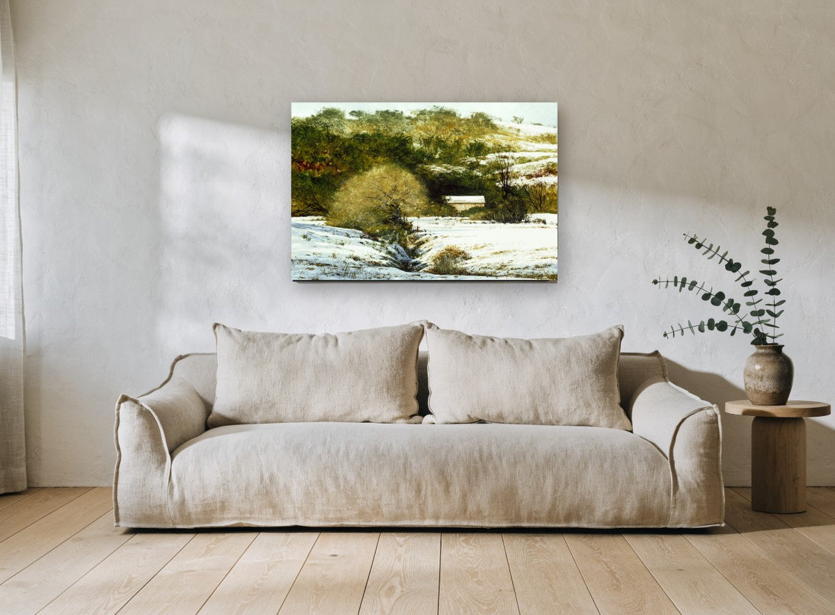 Snowy Hollow Barn landscape canvas print on the wall of a living room