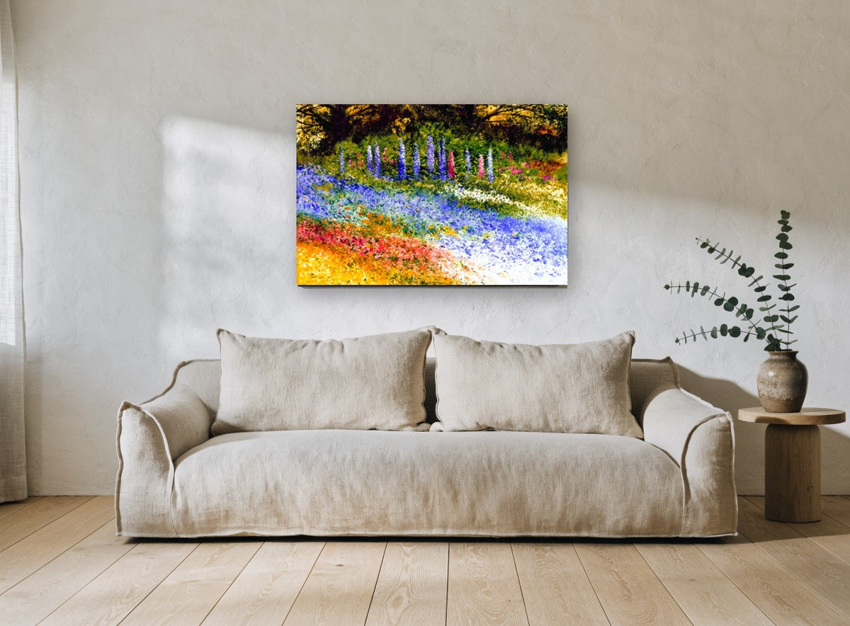 Delphinium Garden Drift floral canvas print on the wall of a living room