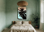 Palm Against Dusk floral canvas print on the wall of a bedroom