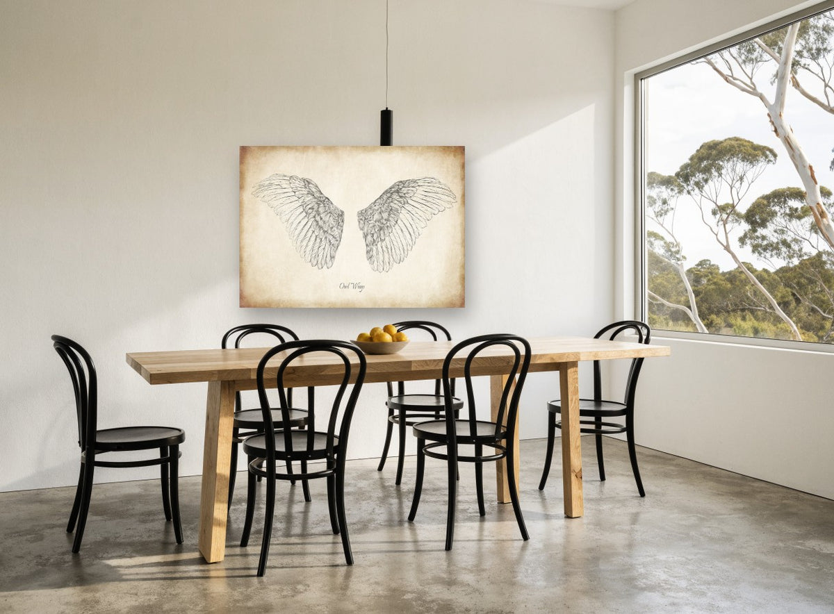 Spread Owl Wings animal canvas print on the wall of a dining room