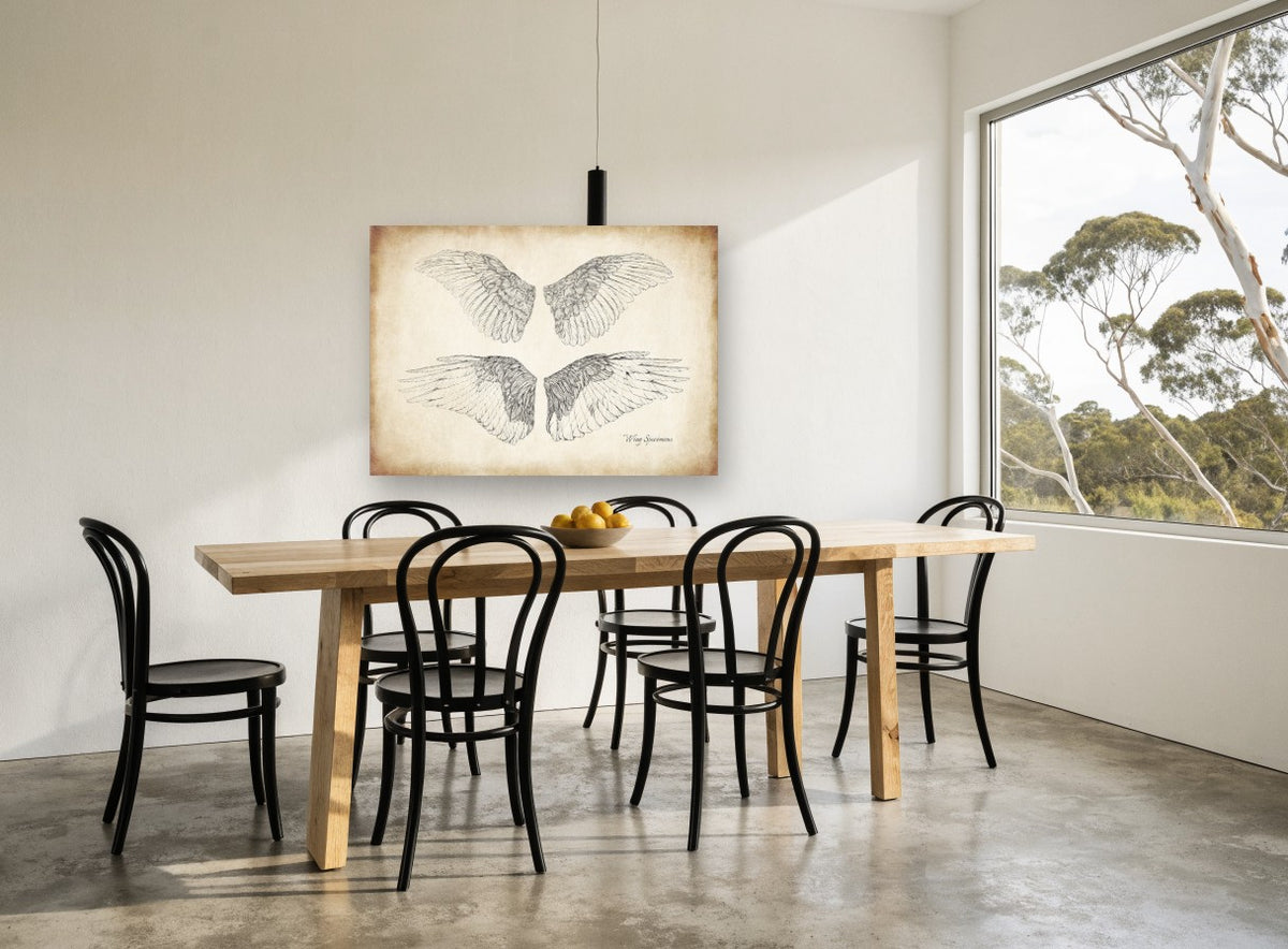 Four Feathered Wings animal canvas print on the wall of a dining room