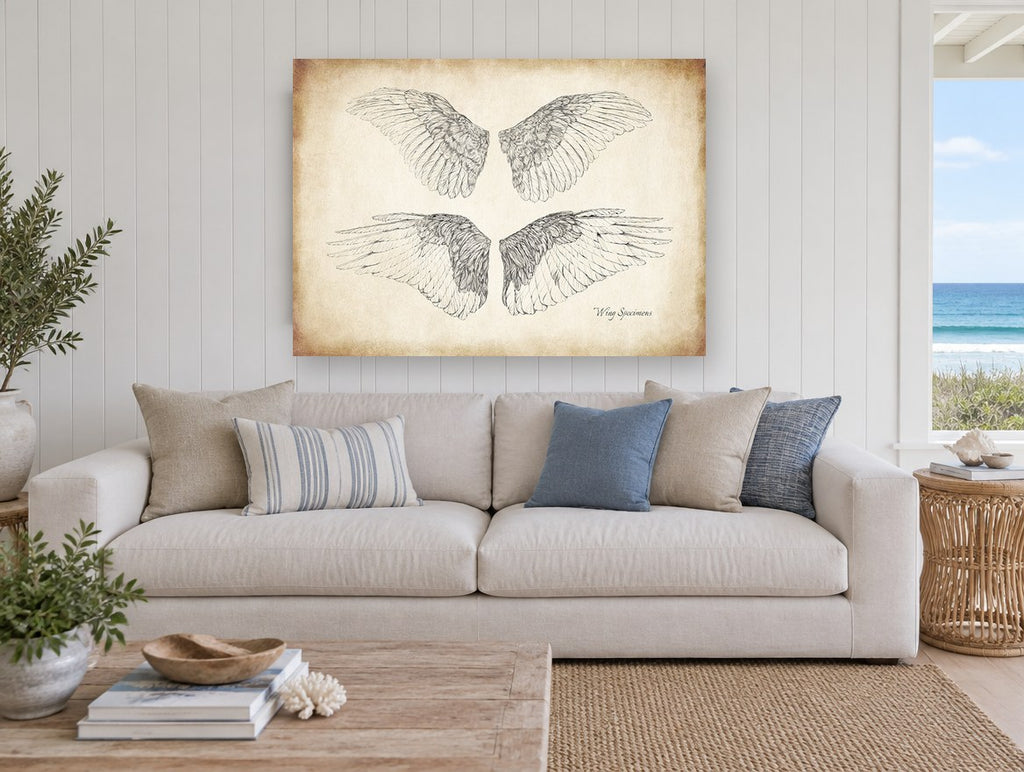 Four Feathered Wings animal canvas print on the wall of a beach house living room