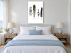 Four Feather Study animal canvas print on the wall of a bedroom