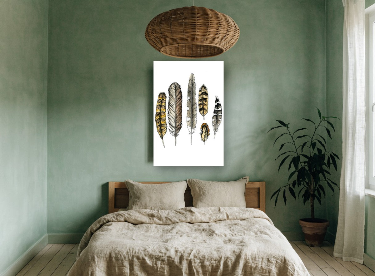 Six Owl Feathers animal canvas print on the wall of a bedroom