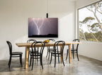 Forked Storm Light landscape canvas print on the wall of a dining room