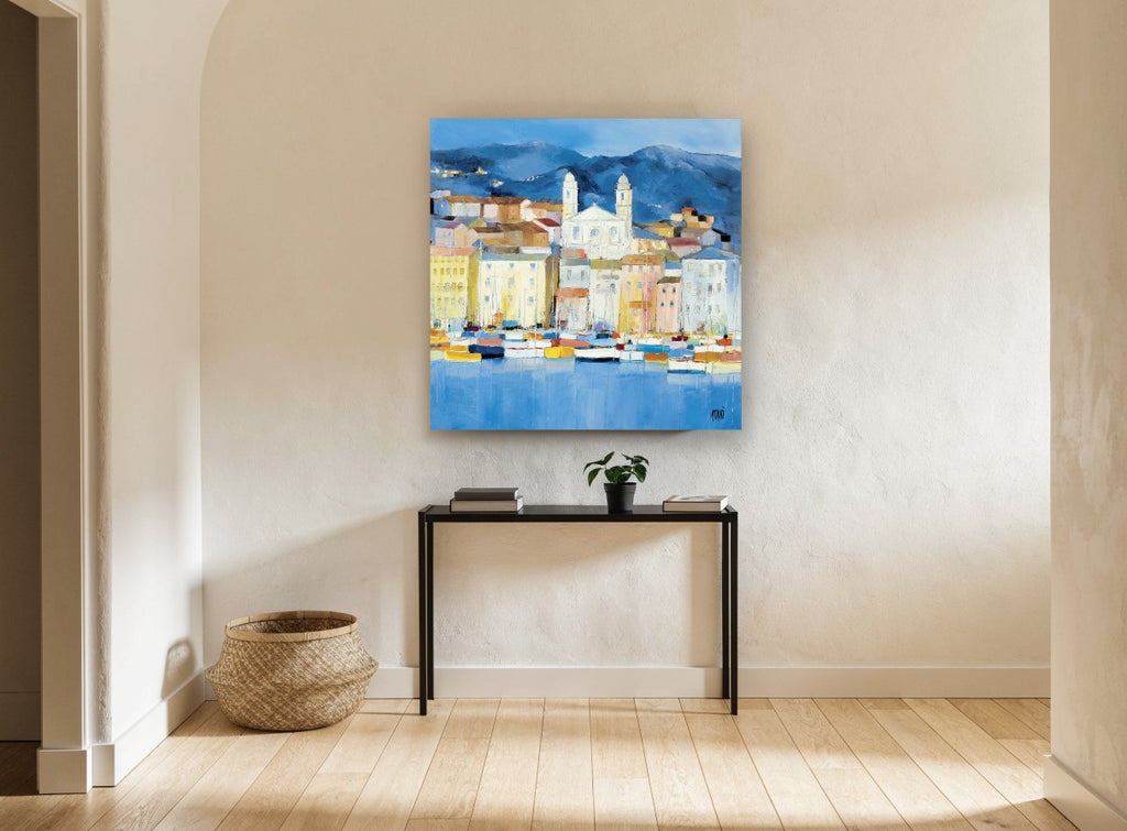 Blue Harbour Village landscape canvas print on the wall of a hallway