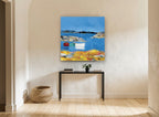 Three Boats Moored Cove coastal canvas print on the wall of a hallway