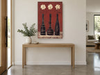 Three Cream Daisies in Red floral canvas print on the wall of a entry hall