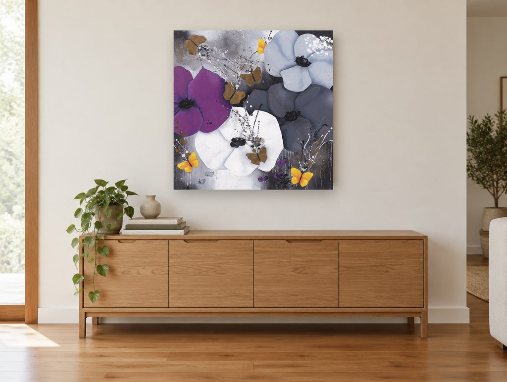 Midnight Poppies and Butterflies floral canvas print on the wall of a living room above a sideboard