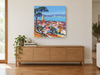 Bay Above Terracotta Roofs landscape canvas print on the wall of a living room above a sideboard