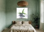 Stacked Stones Bamboo Calm floral canvas print on the wall of a bedroom