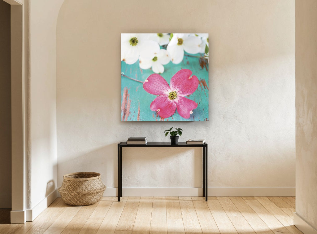 Pink Dogwood on Teal floral canvas print on the wall of a hallway