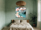 Blossoms in Aqua Bowl floral canvas print on the wall of a bedroom