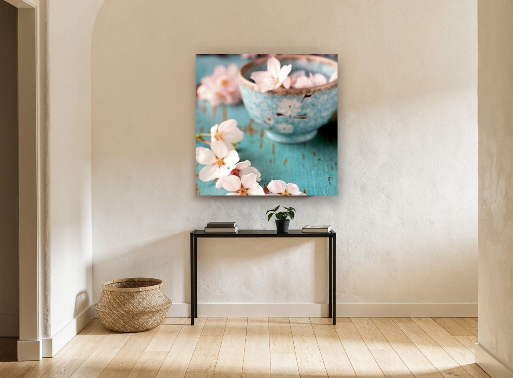 Blossoms in Aqua Bowl floral canvas print on the wall of a hallway