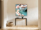 Blossoms in Aqua Bowl floral canvas print on the wall of a hallway