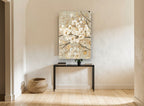 Gilded Cream Blossoms floral canvas print on the wall of a hallway