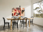 Pressed Garden Silhouettes floral canvas print on the wall of a dining room