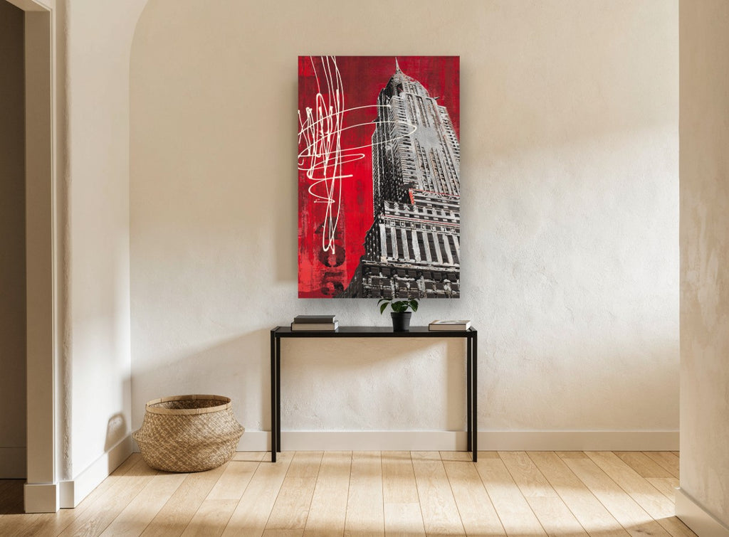 Red Art Deco Spire city canvas print on the wall of a hallway