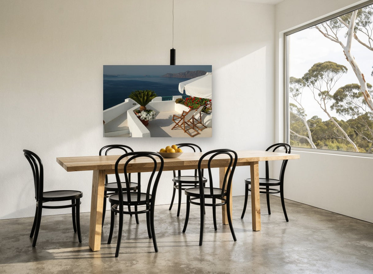 Terrace Above the Caldera coastal canvas print on the wall of a dining room