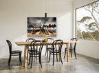 Stormy Beach Hut Stairs coastal canvas print on the wall of a dining room