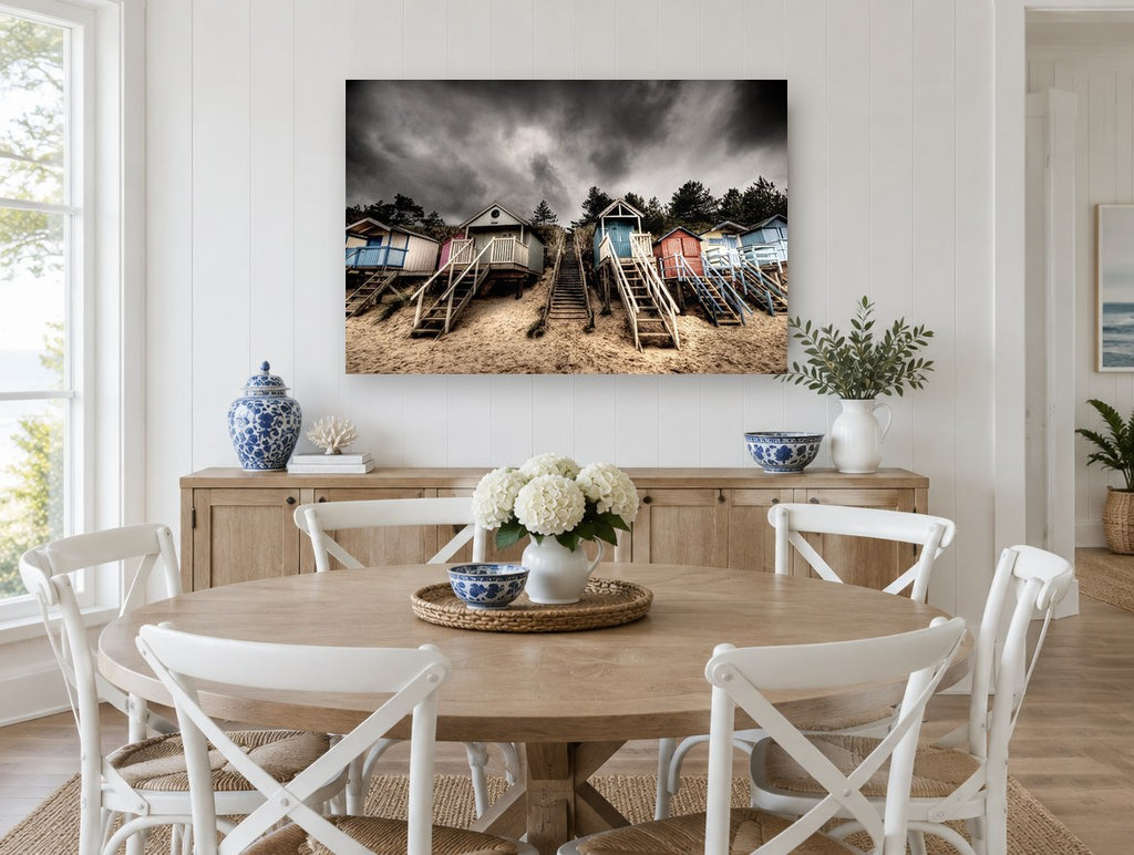 Stormy Beach Hut Stairs coastal canvas print on the wall of a Hamptons dining room