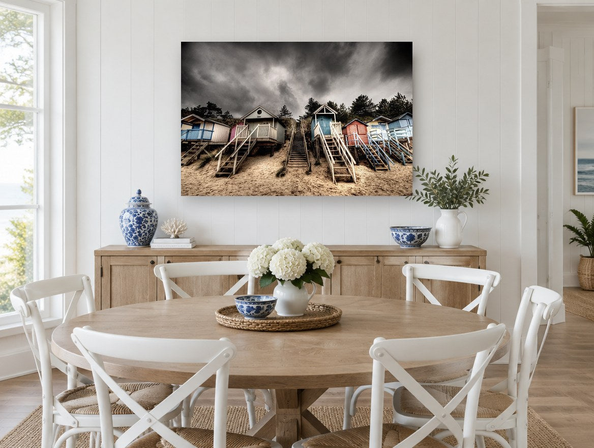 Stormy Beach Hut Stairs coastal canvas print on the wall of a Hamptons dining room