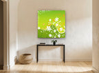 Green Meadow Swirl floral canvas print on the wall of a hallway